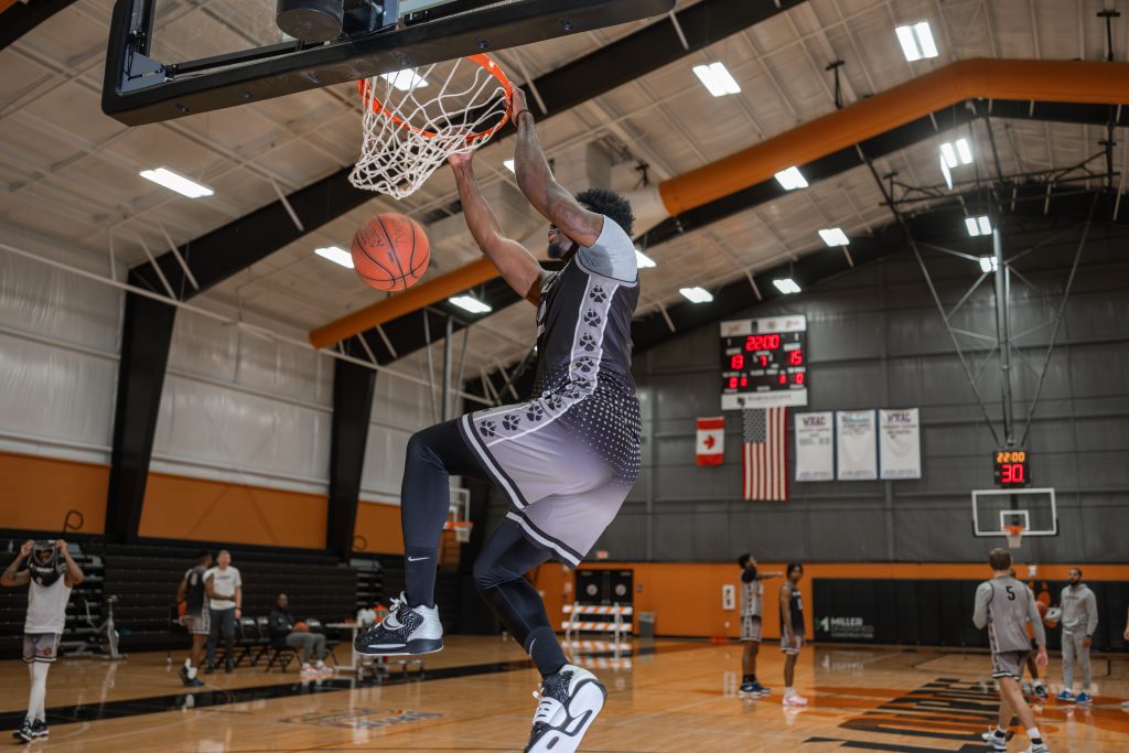 DSCF8475-Enhanced-NR Basketball player dunking the ball