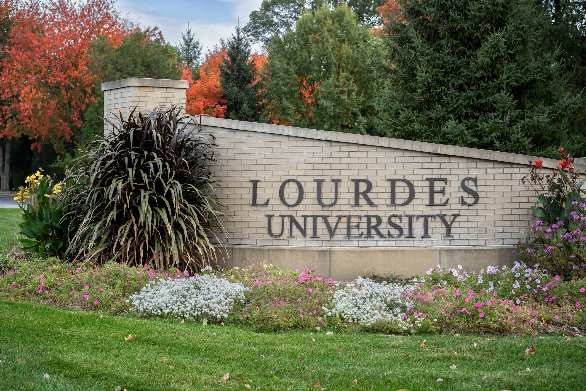 Lourdes Entrance Sign